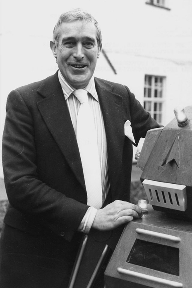 Terry Nation, at home, with a Doctor Who creation